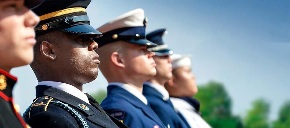 Photo of Soldiers standing at attention in Dress Blues